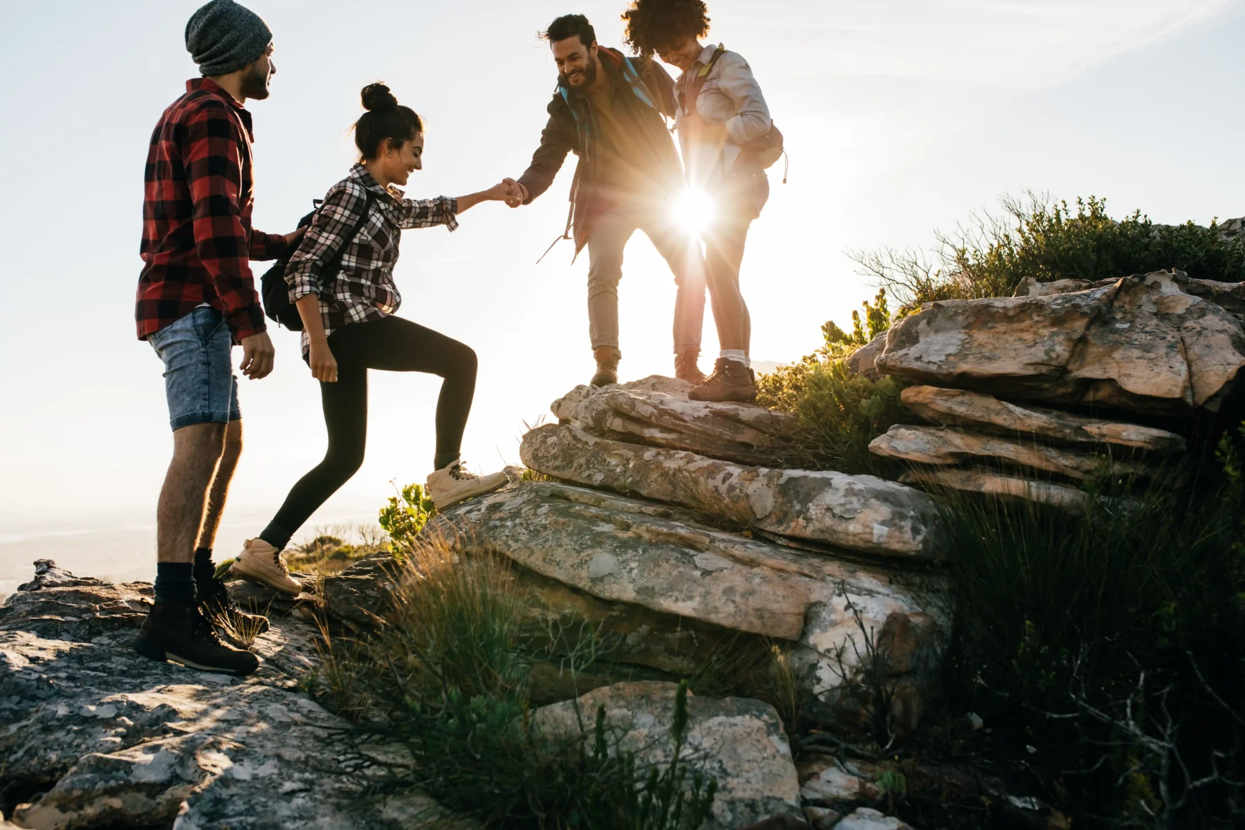 A group of friends climbing a mountain
