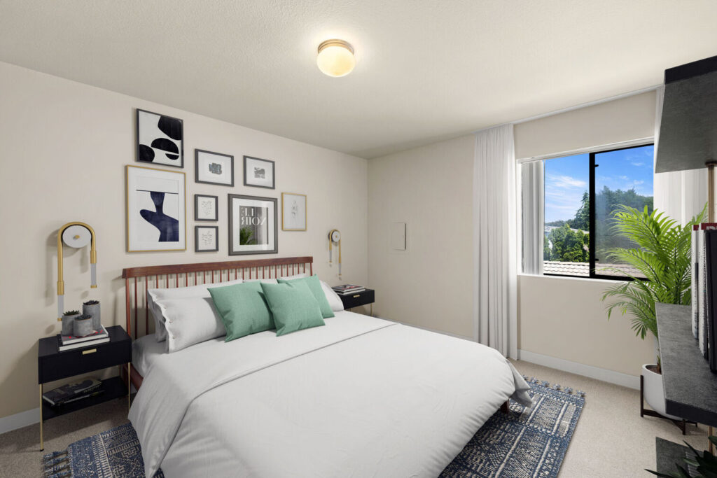 Furnished bedroom with a window at Lake Crest apartments in Milwaukie, OR